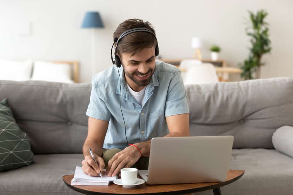 man taking online course